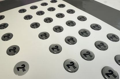 Sheet of round stickers with '2nd' printed on them, arranged in a grid pattern.